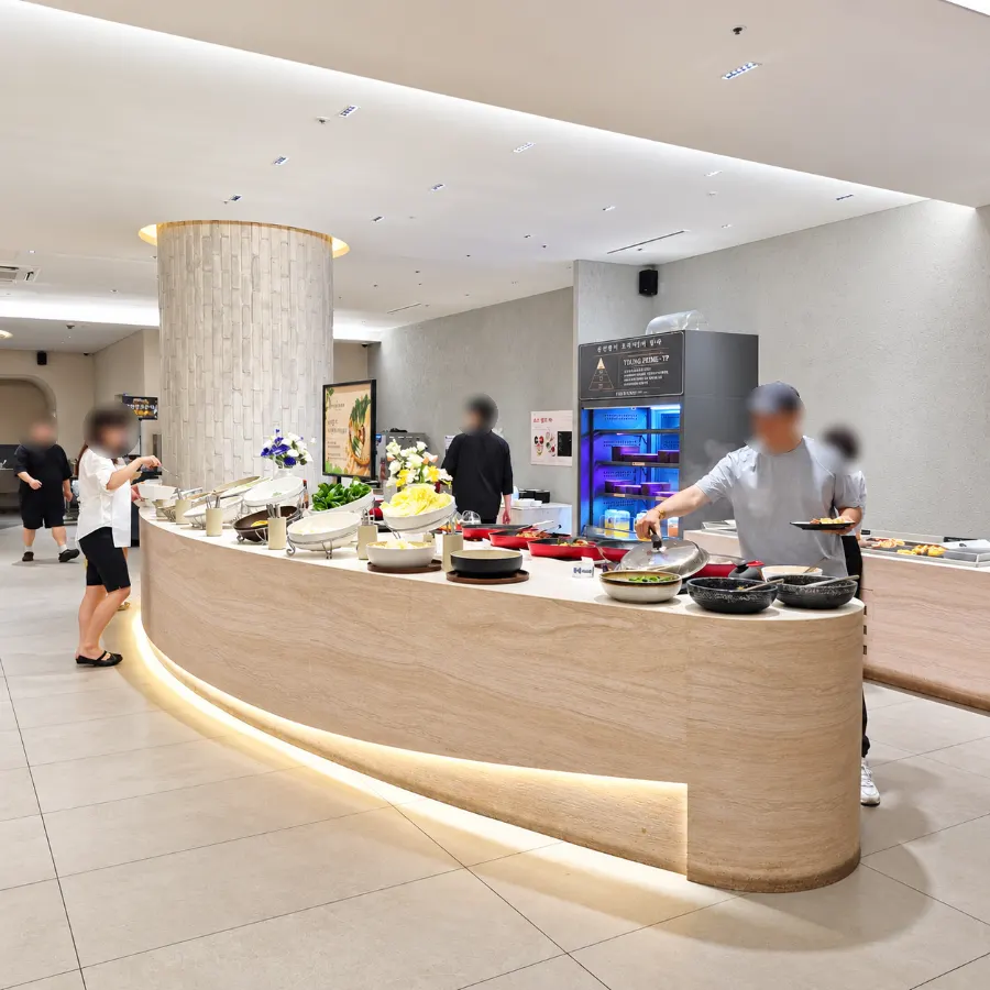 Oval self-service bar running through the restaurant