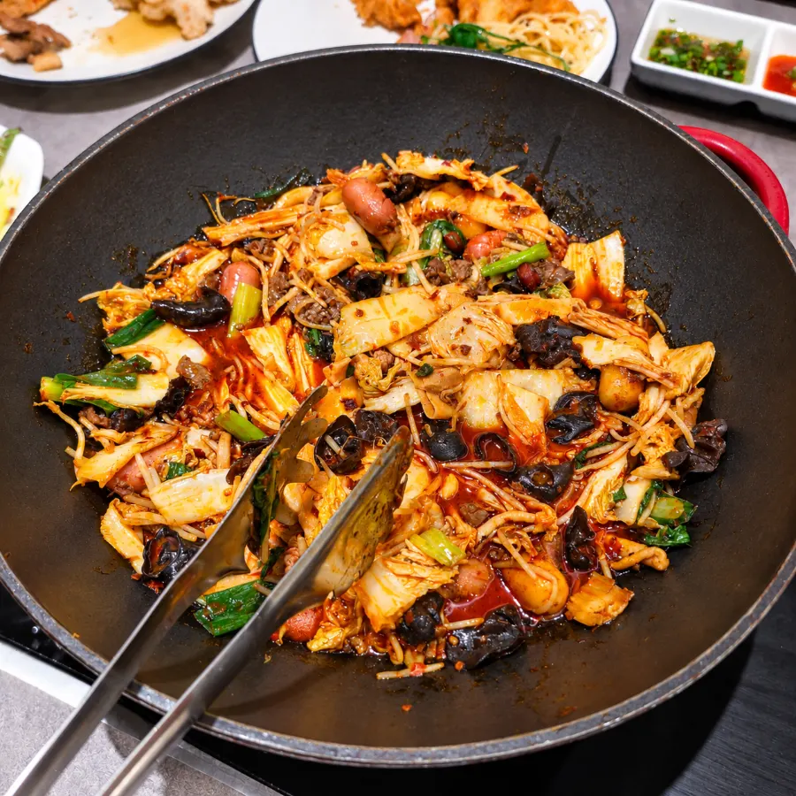 Mala xiang guo with sausage and tofu noodles