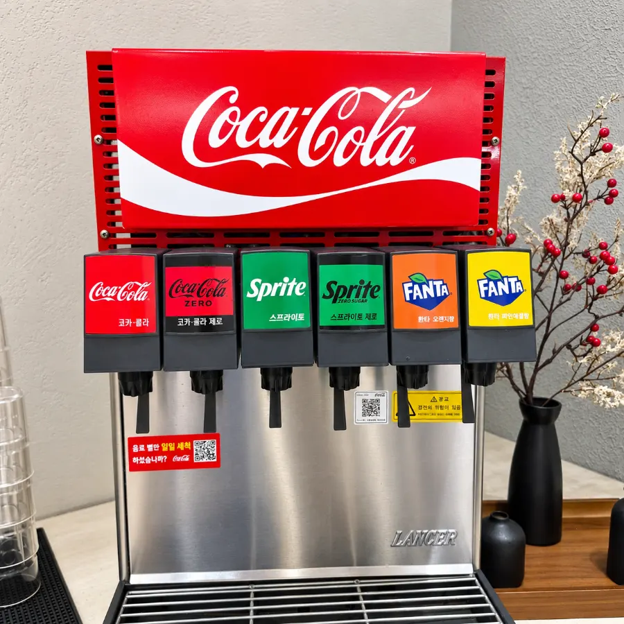 Drink station with soft drinks and juice