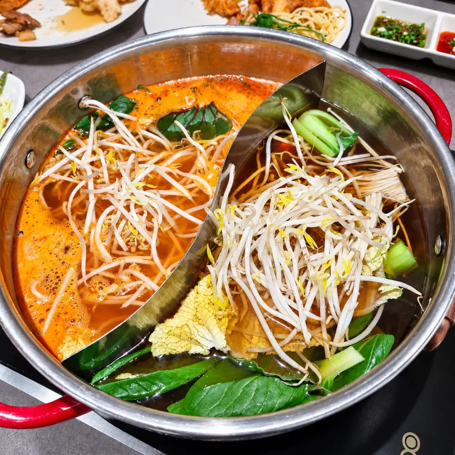 Shabu-shabu with vegetables and meat added to the broth