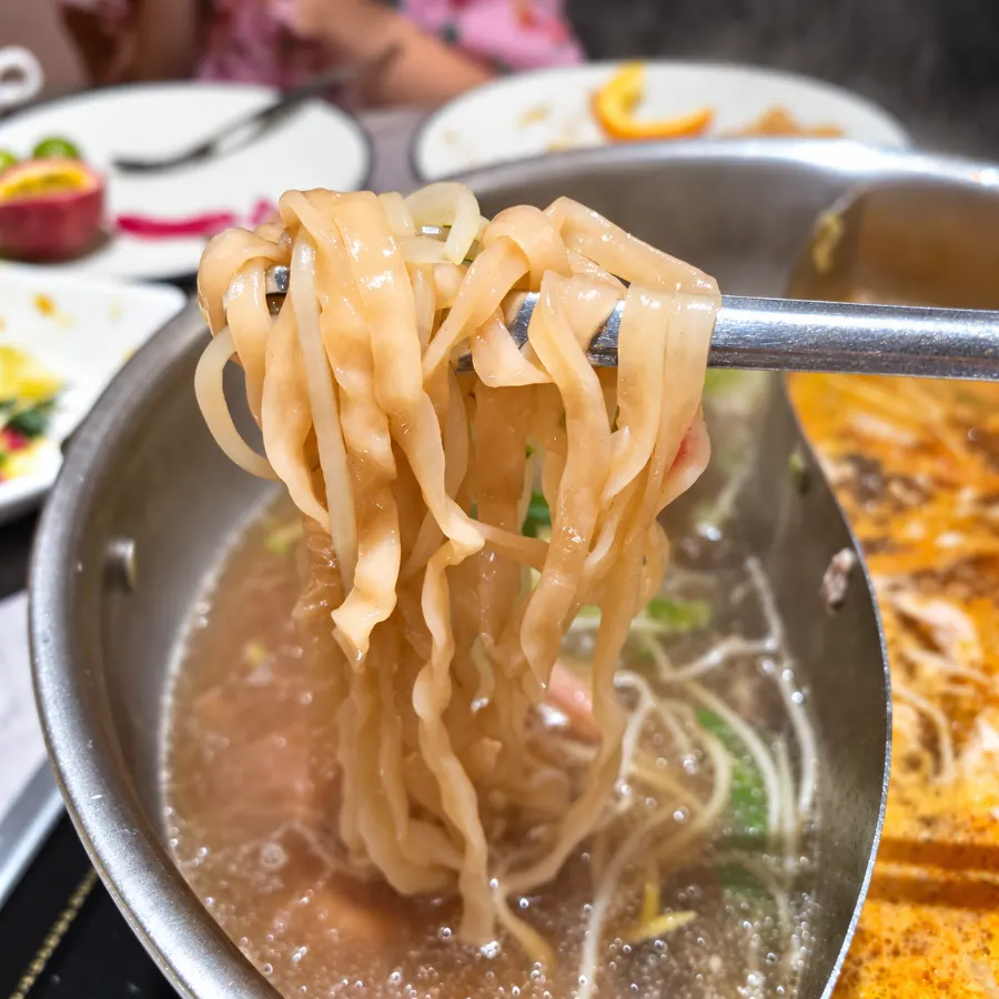 Kalguksu cooked in rich broth