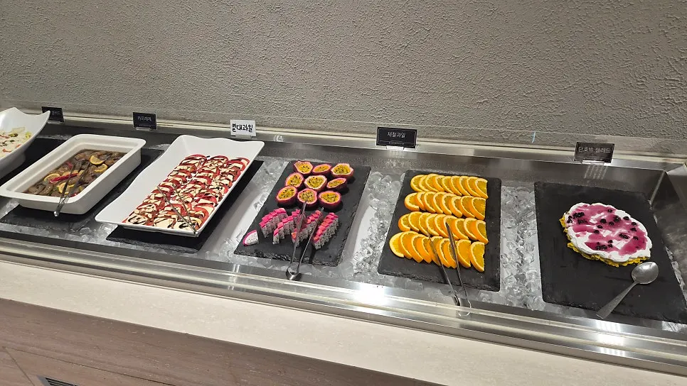 Meal spread with soft drinks and ice cream