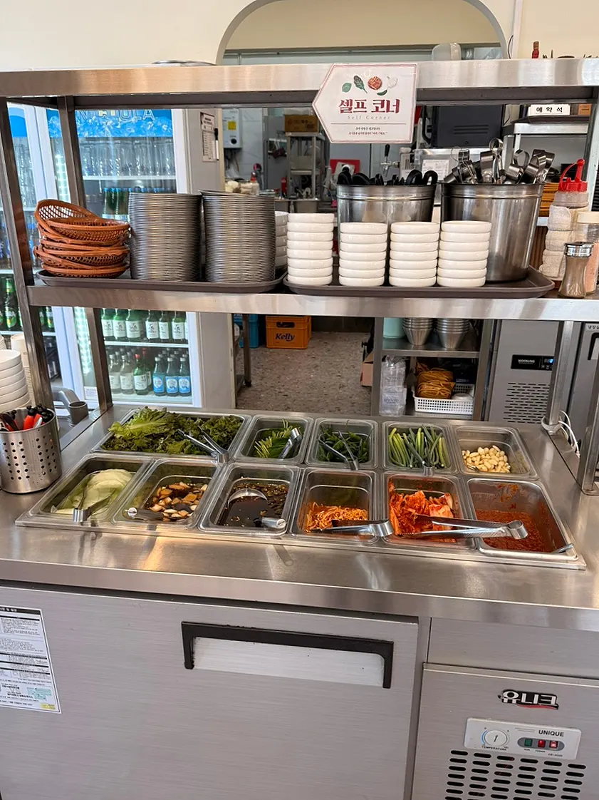 Self-serve side-dish bar in front of the kitchen