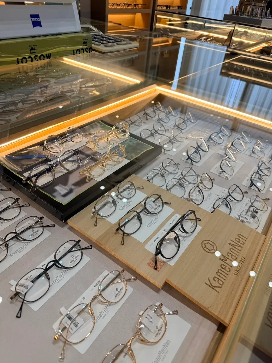 Display case holding a variety of sunglasses