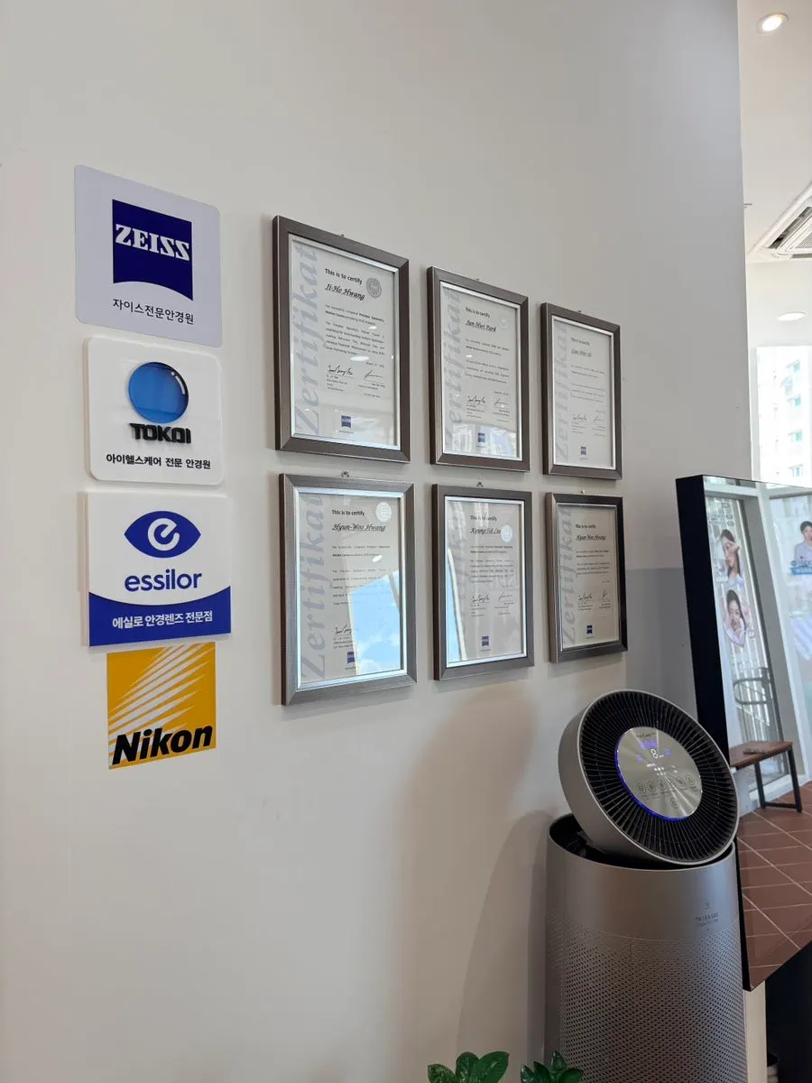 A tidy frame display shelf in one corner of the store