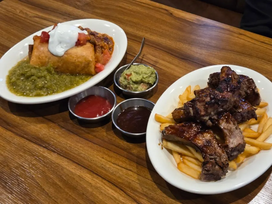 Full spread of chimichanga and barbecue ribs