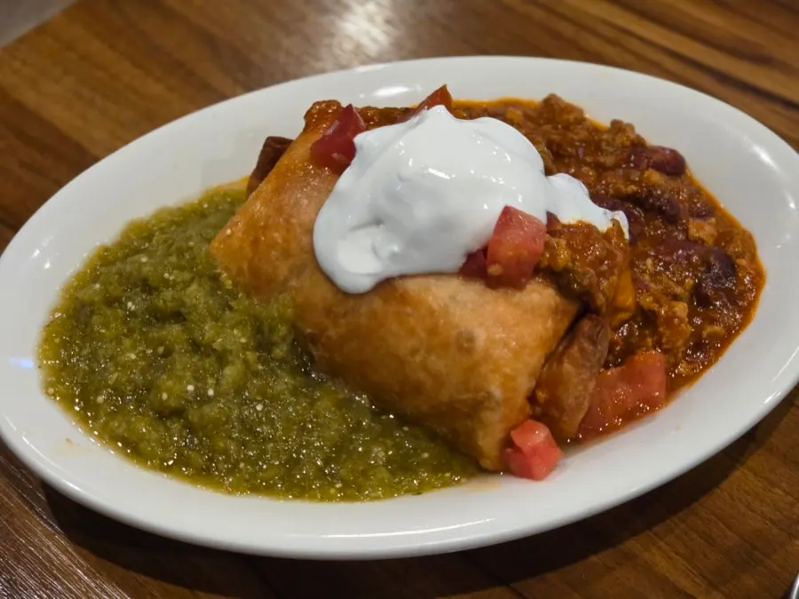 Chimichanga topped with sour cream