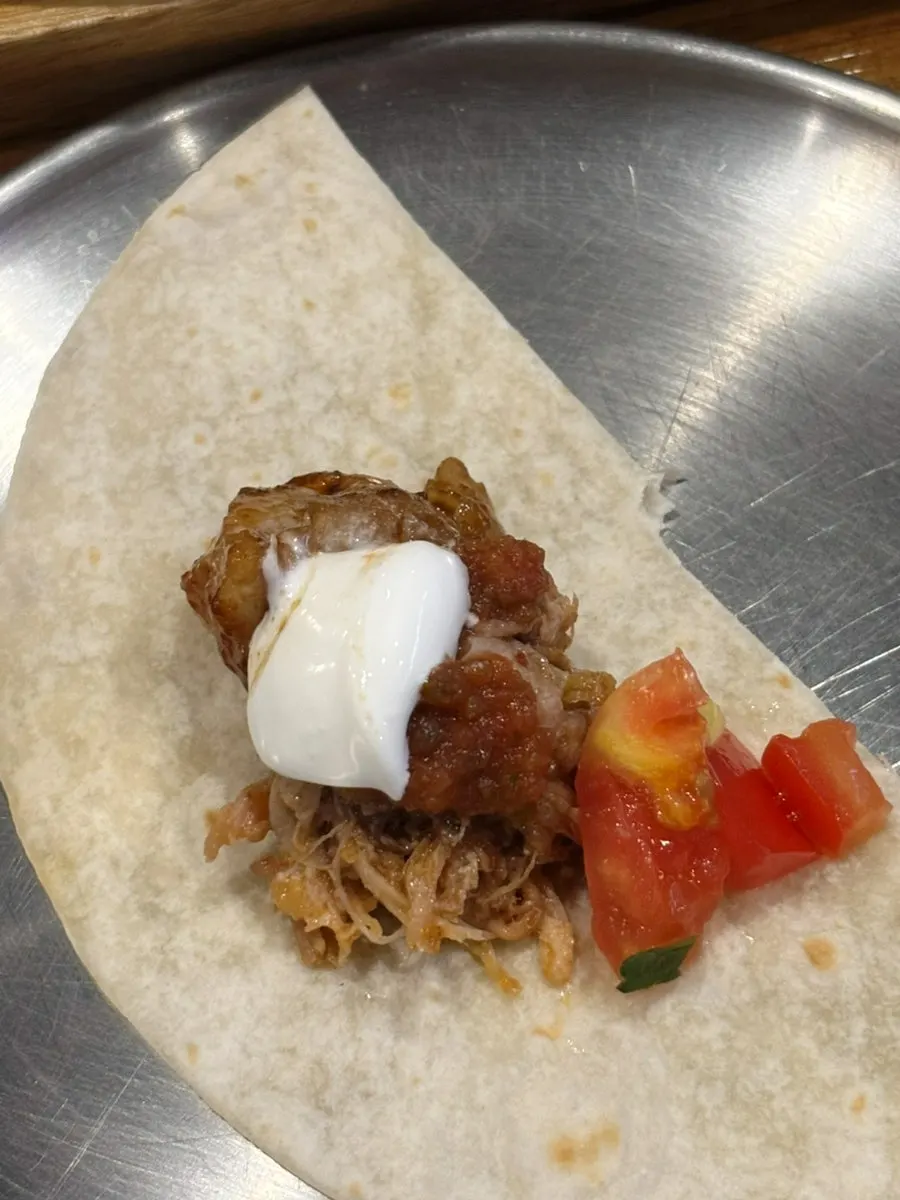 Tortilla topped with sauces to taste