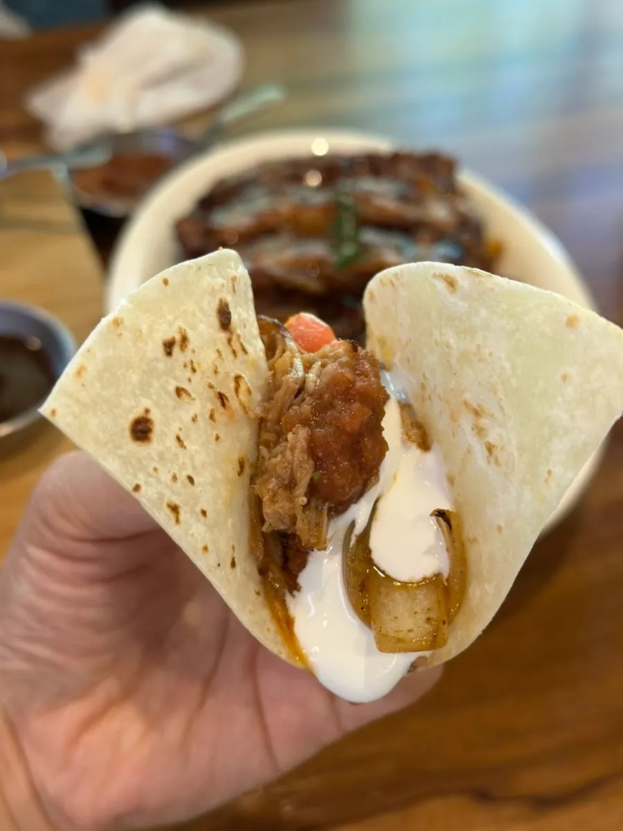 Shrimp and grilled onions on the fajita platter