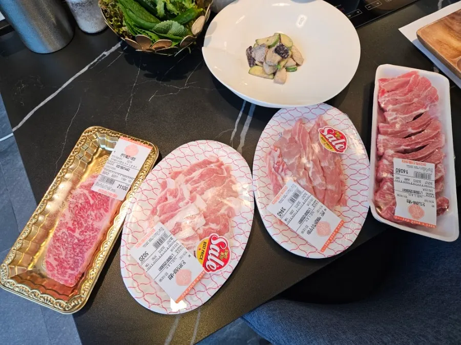 Striploin and back ribs on the barbecue
