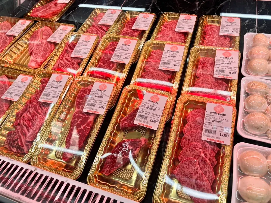 Korean beef ribeye and striploin in Ari Chuksan's refrigerated display