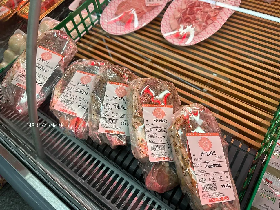 Raw meat cuts divided and arranged for a barbecue setup