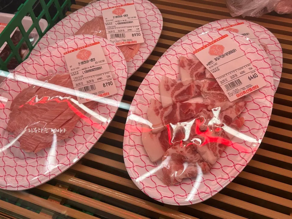Whole pork belly, pork shoulder and pork tomahawk on display