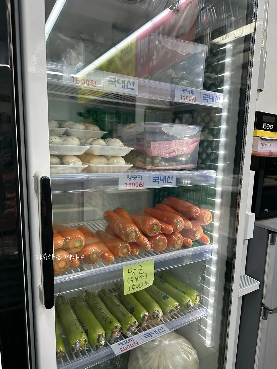 Small-size sauces on display, including ssamjang and wasabi