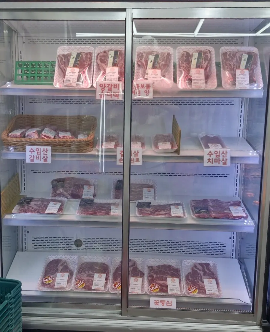 Refrigerated case of homemade seasoned meats