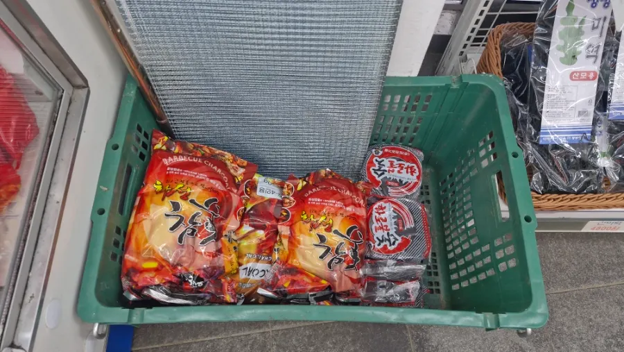Store corner displaying barbecue side ingredients