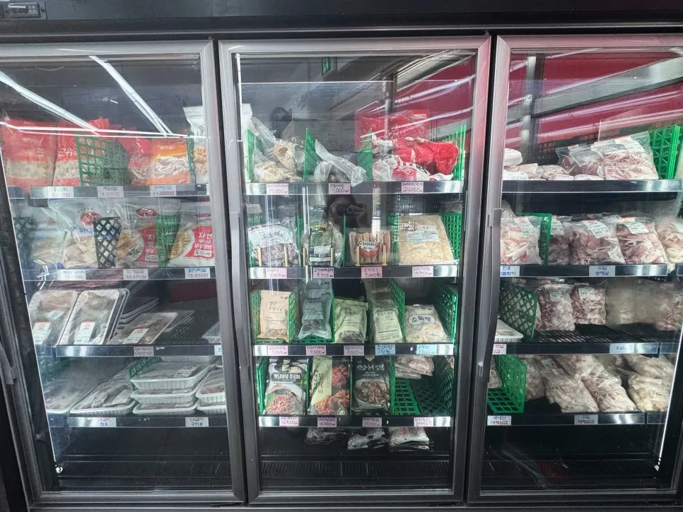 Shelf with food items and sauces