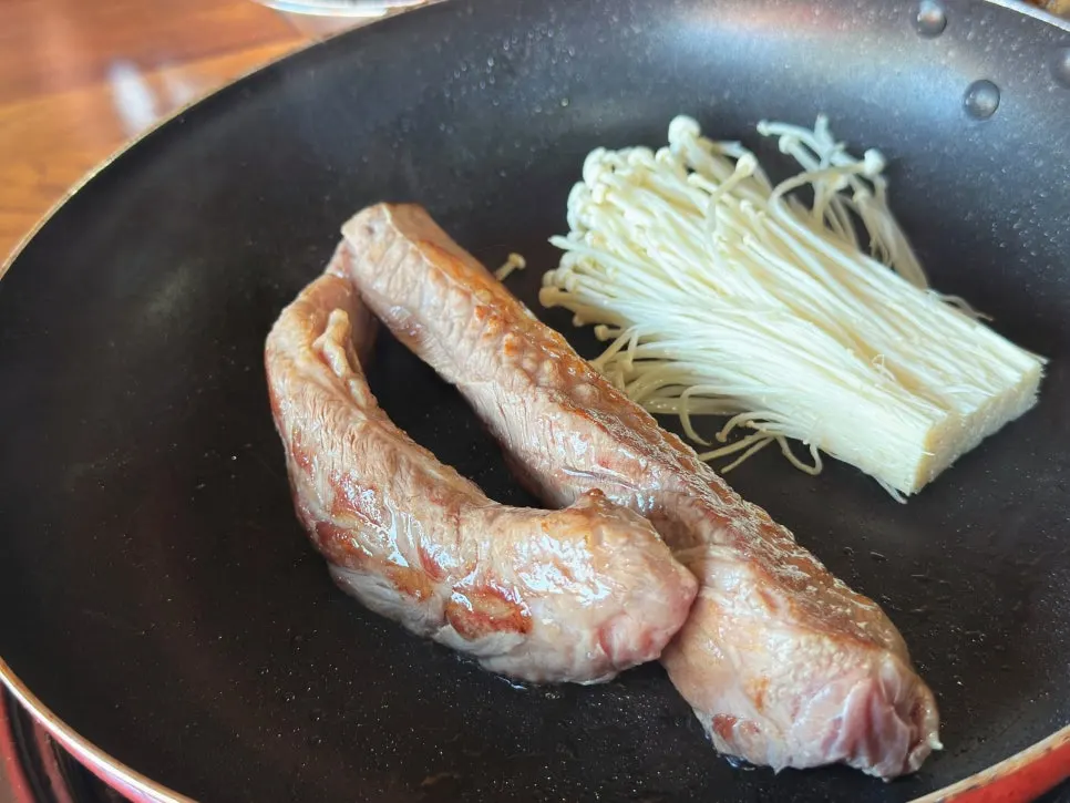Free stew meat and enoki mushrooms received as a bonus