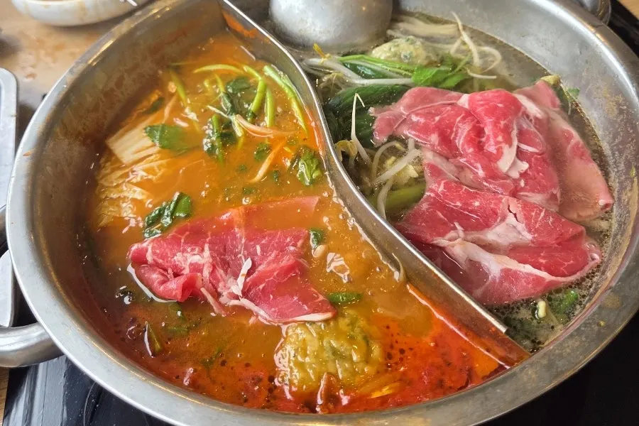 Minari shabu-shabu pot piled high with vegetables