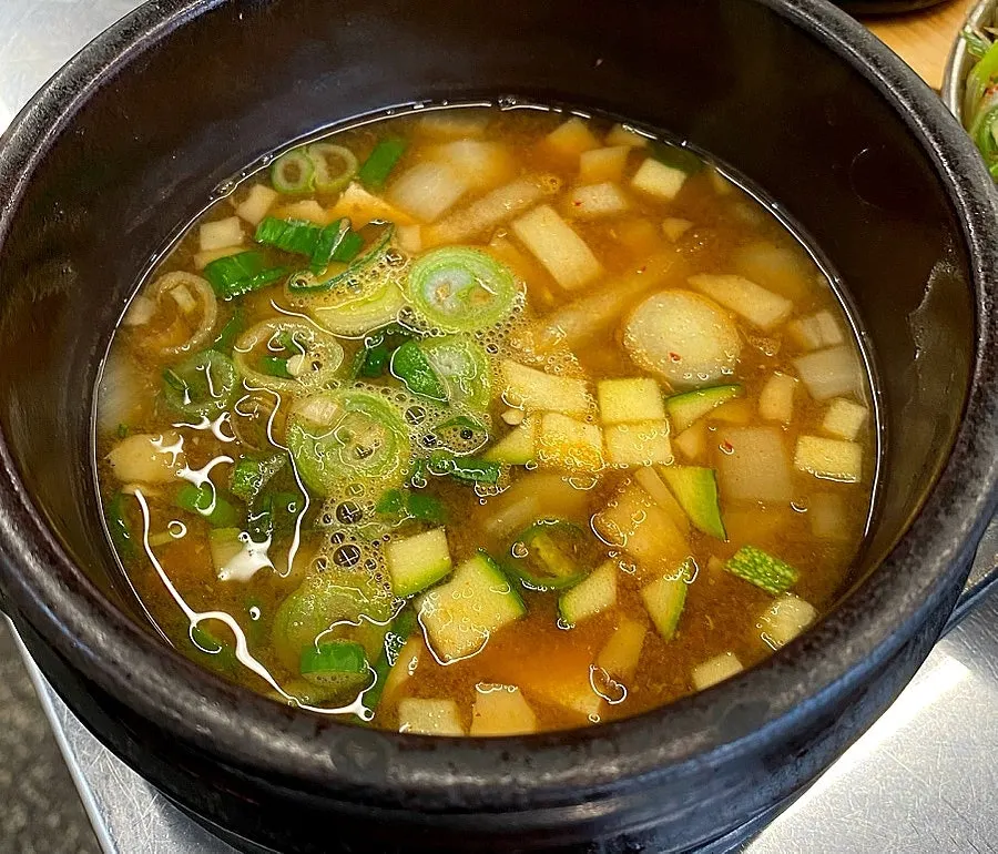 Complimentary doenjang stew and corn cheese