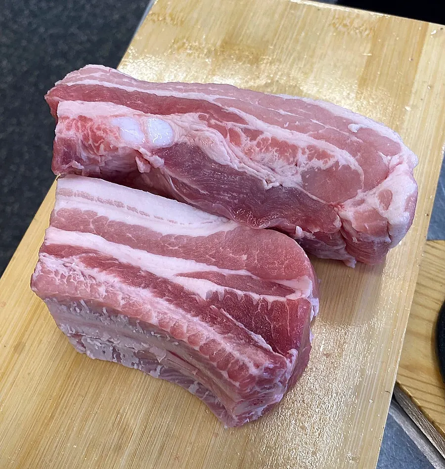 Two thick servings of fresh pork rib