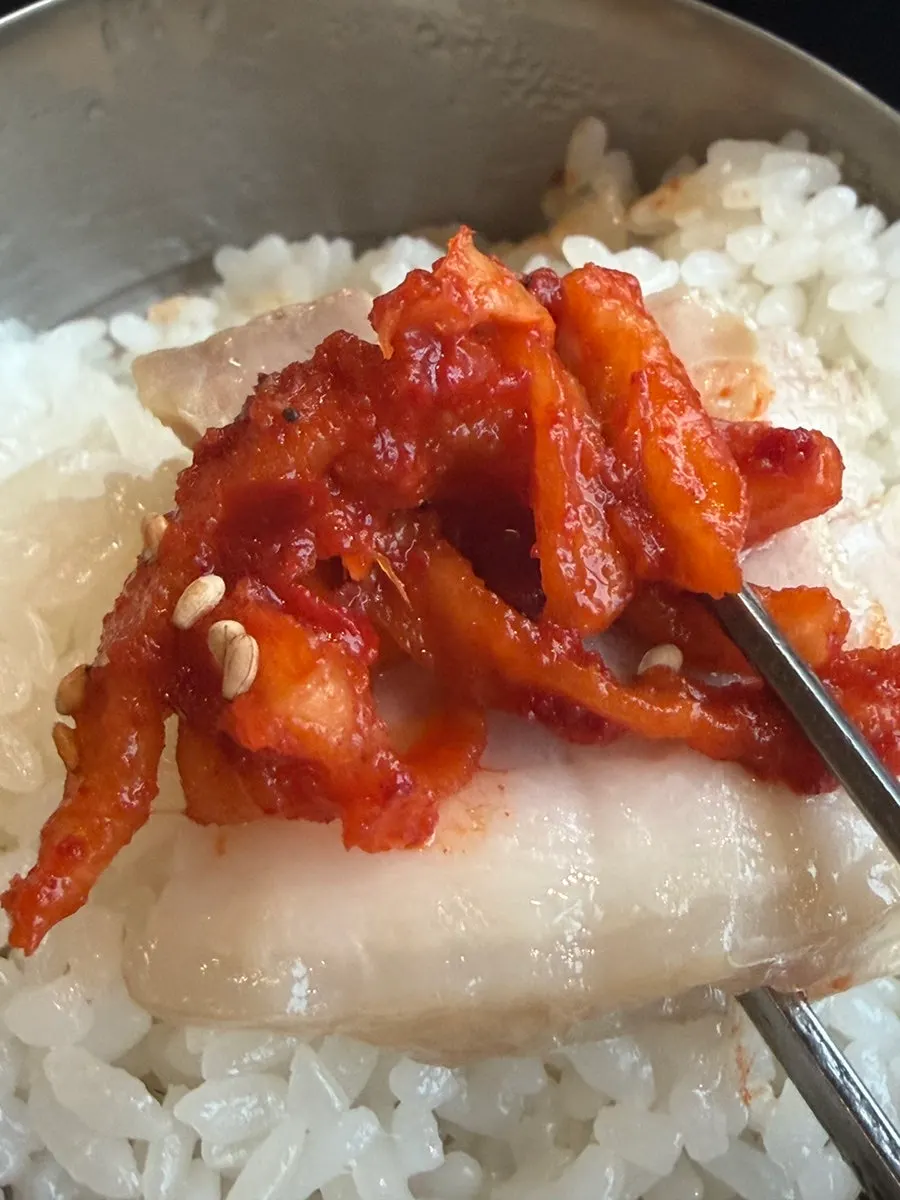 Ogyeop bossam served with dried radish side dish