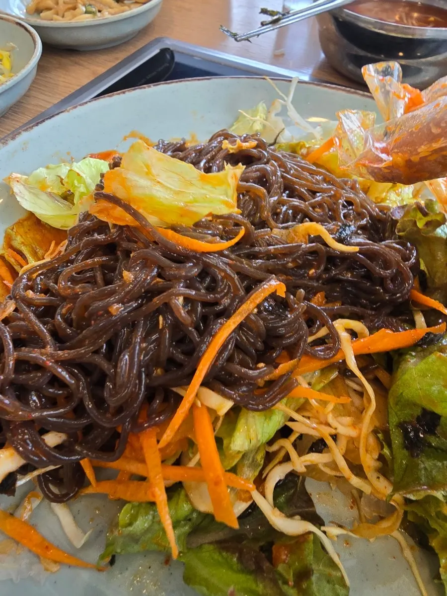 Buckwheat mak guksu noodles mixed with sauce