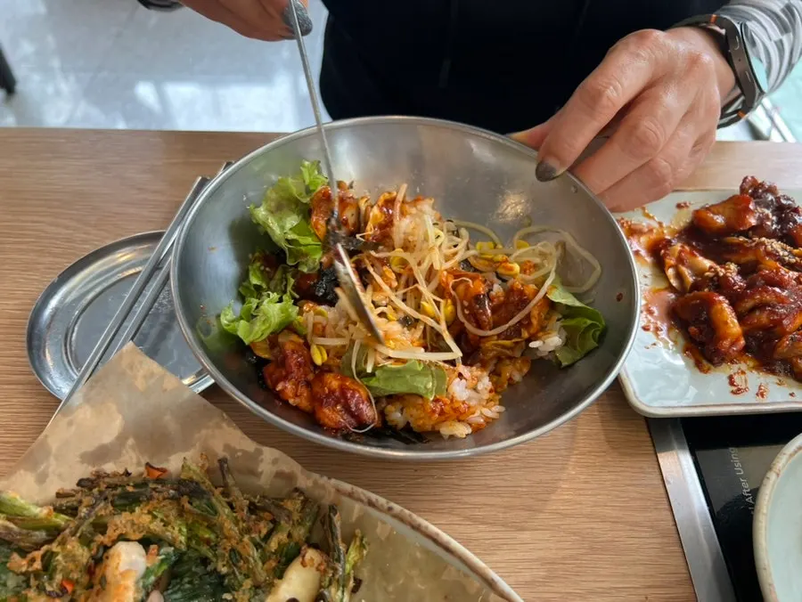 Lunch spread with bossam set, spicy octopus set, and seafood pancake together