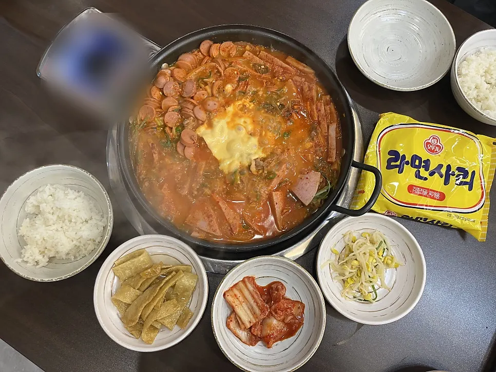 Budae-jjigae broth after being stirred by staff
