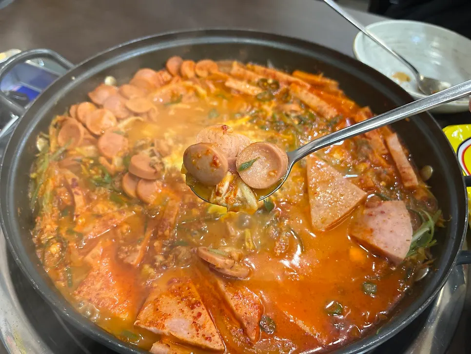 Budae-jjigae topped with cheese add-in
