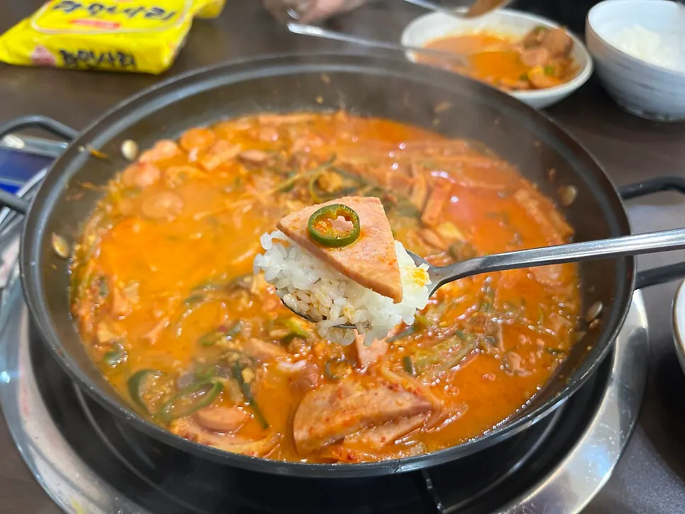 Melted cheese in the budae-jjigae broth