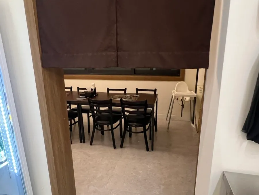 Interior of Cheongwon with a small room next to the self-serve bar