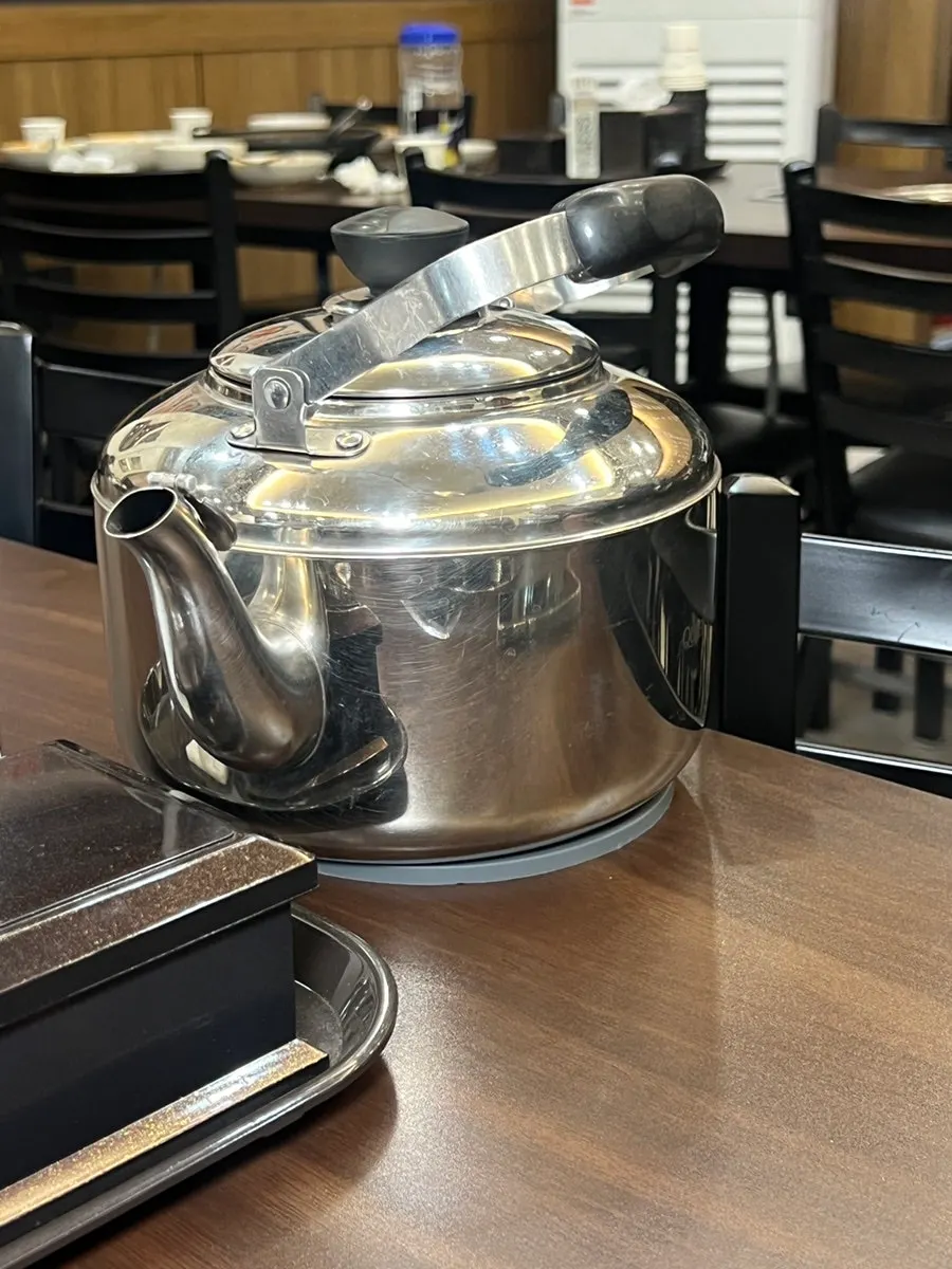 Broth kettle set up on the table