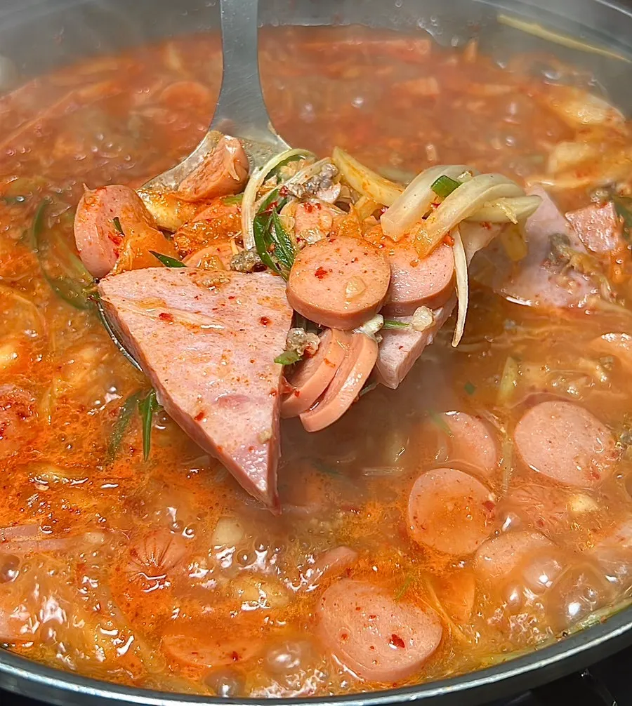 Broth of Songtan budae-jjigae full of ham