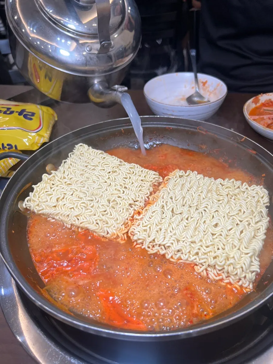 Budae-jjigae with two ramyeon noodle packets added