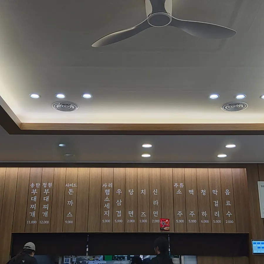 Tables inside Cheongwon Restaurant filled with lunch customers