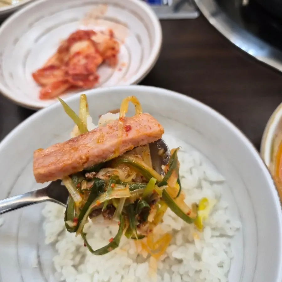 Close-up of the rich broth in Cheongwon budae-jjigae