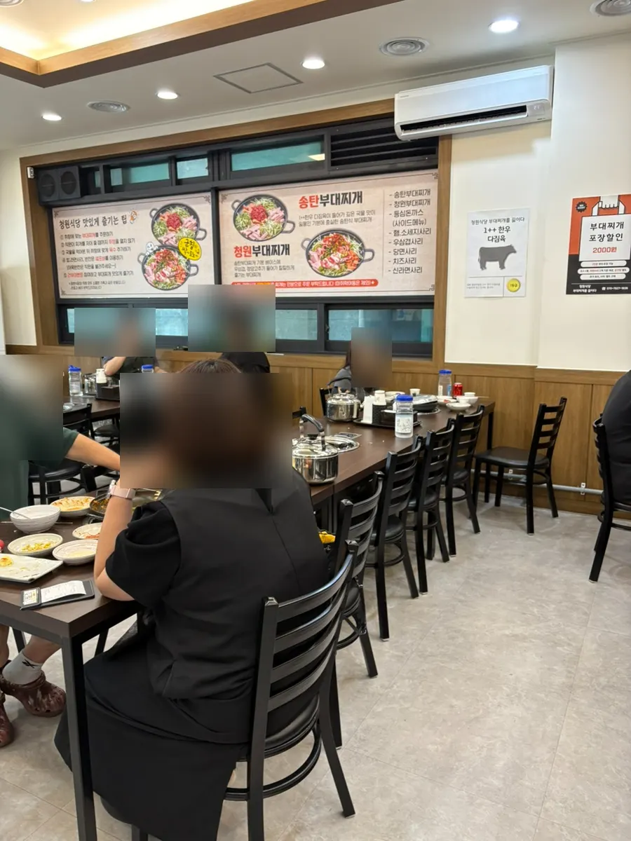 The hall packed with weekend lunch customers