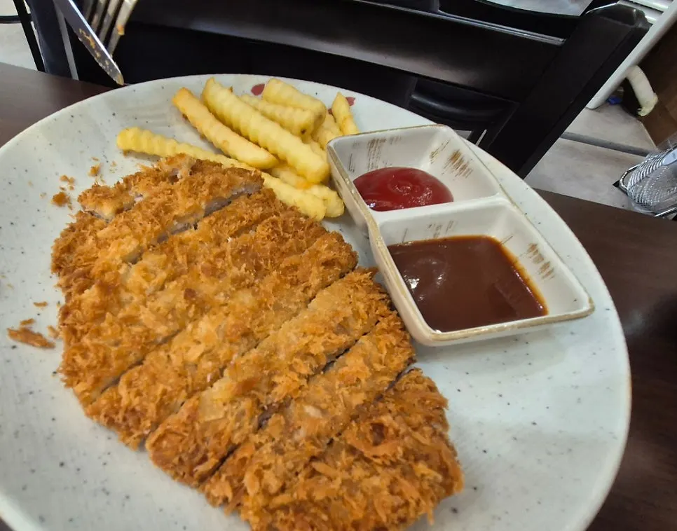 Kids' pork cutlet plate served with fries