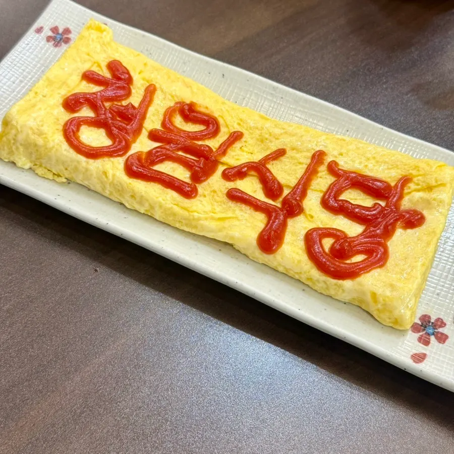 Thick free egg roll served as a complimentary side
