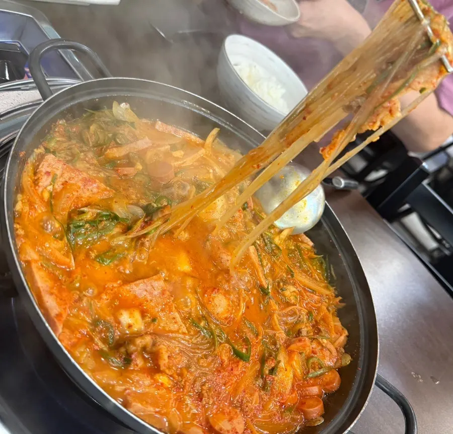 Cheongwon budae-jjigae simmering with its clean, mildly spicy broth