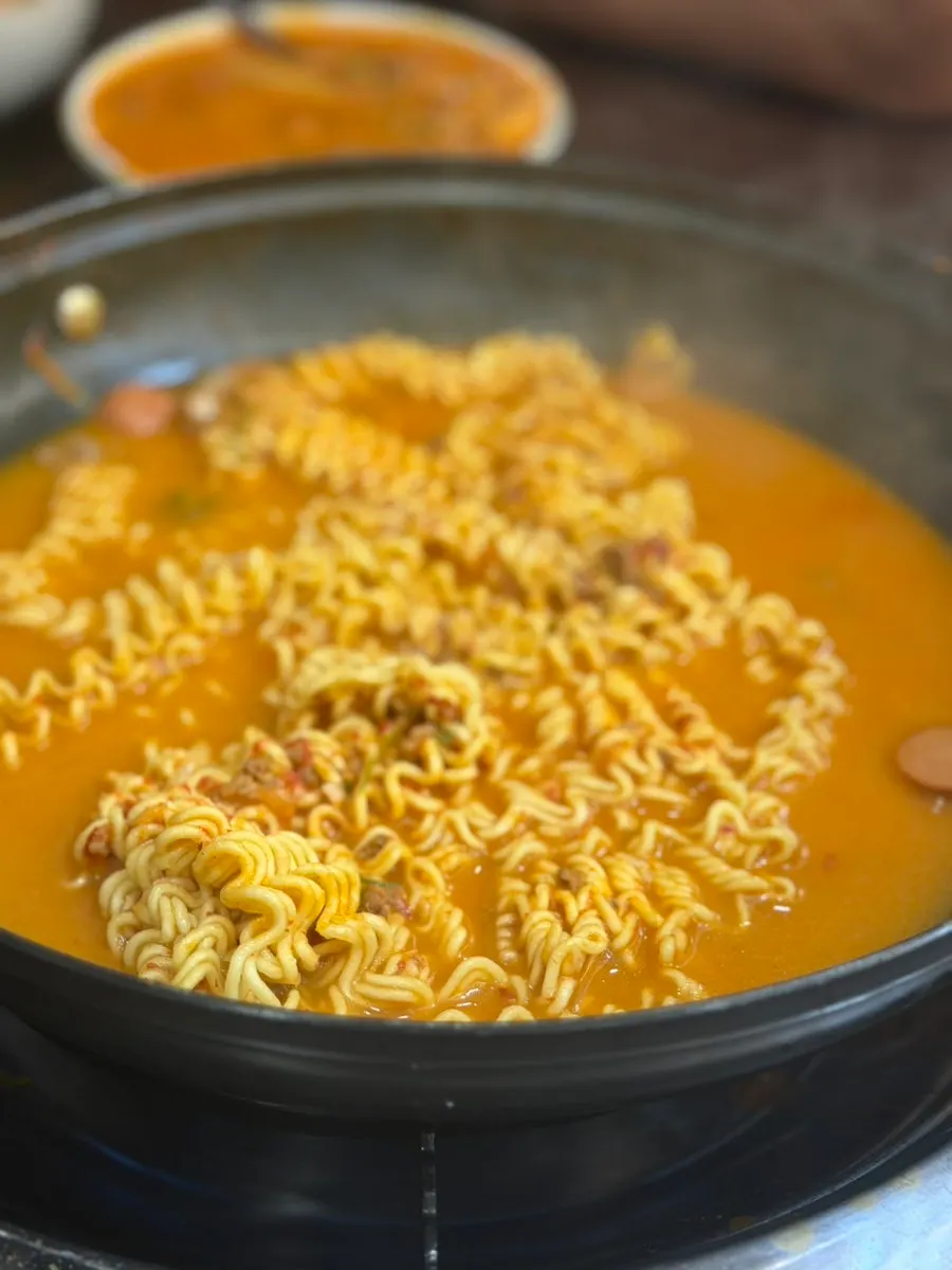Budae-jjigae simmered with ramyeon noodles added