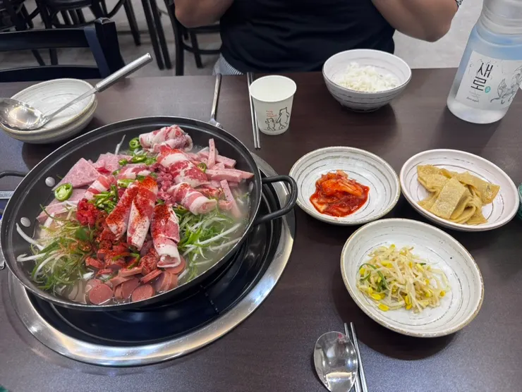Pot of Cheongwon budae-jjigae with ramyeon noodles added