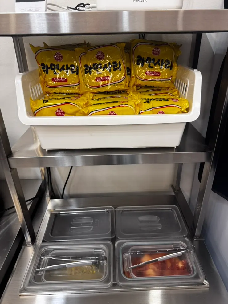 Self-serve bar with unlimited ramyeon noodles and side dishes
