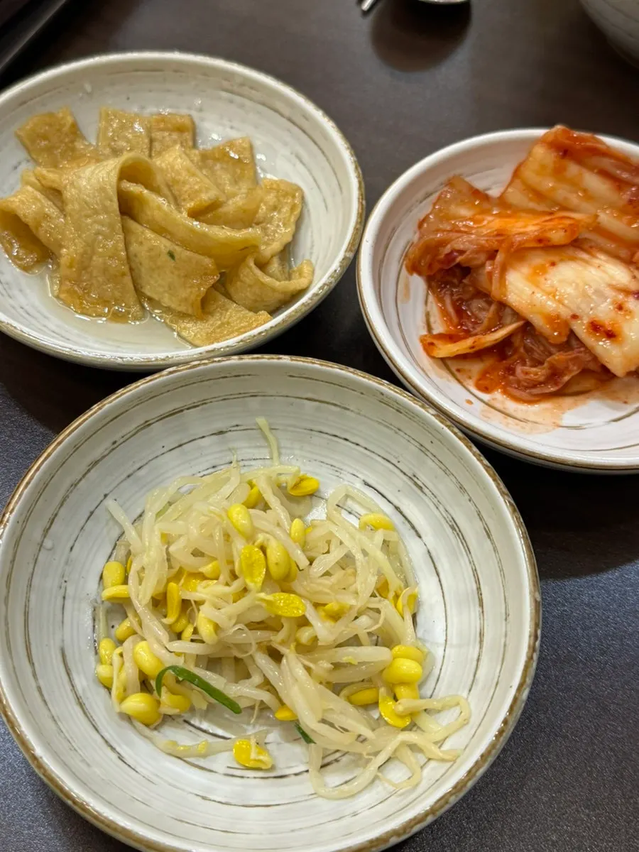 Menu listing Songtan budae-jjigae and Cheongwon budae-jjigae