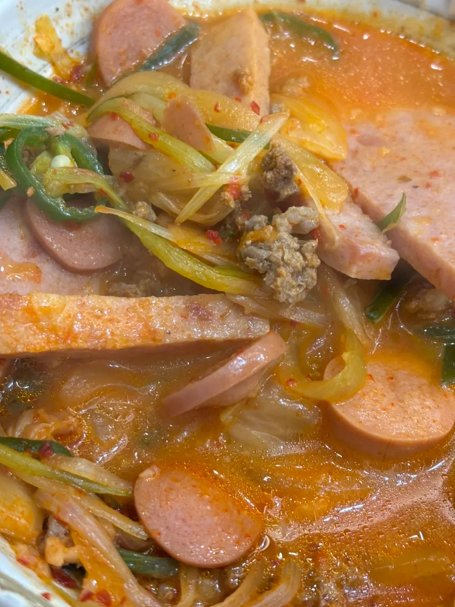 Songtan budae-jjigae with rich broth and generous ham