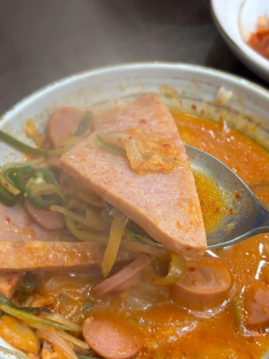 Ham and sausage boiling in the broth