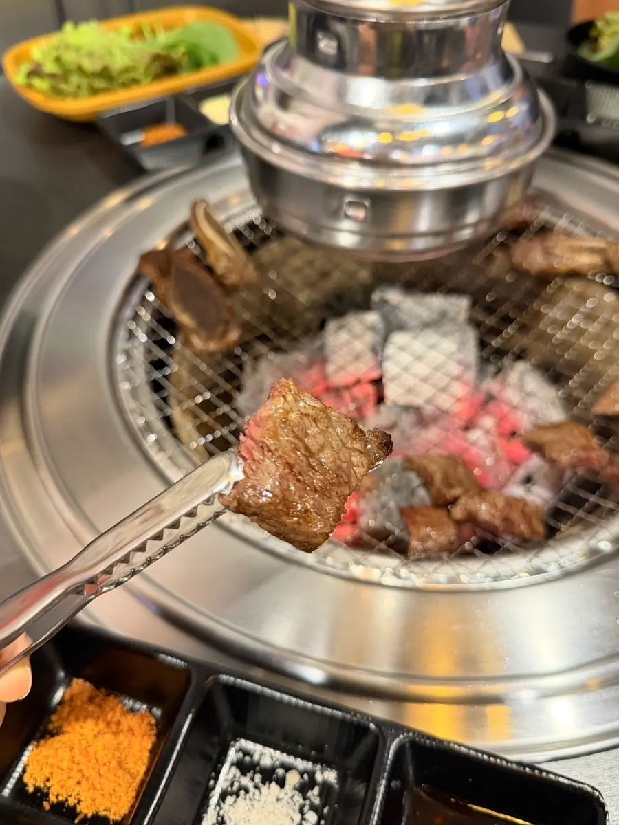 Golden-brown grilled LA-style raw flower beef short ribs