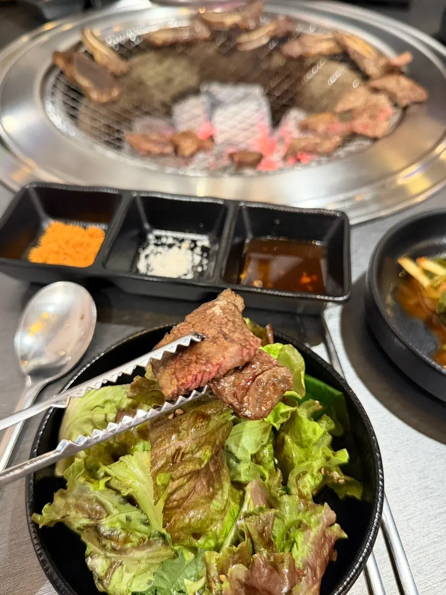 Grilling the remaining beef short ribs on the pan