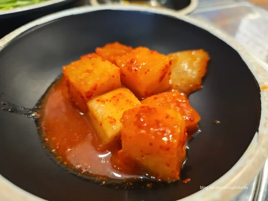Plate of diced radish kimchi, a basic side dish at the restaurant